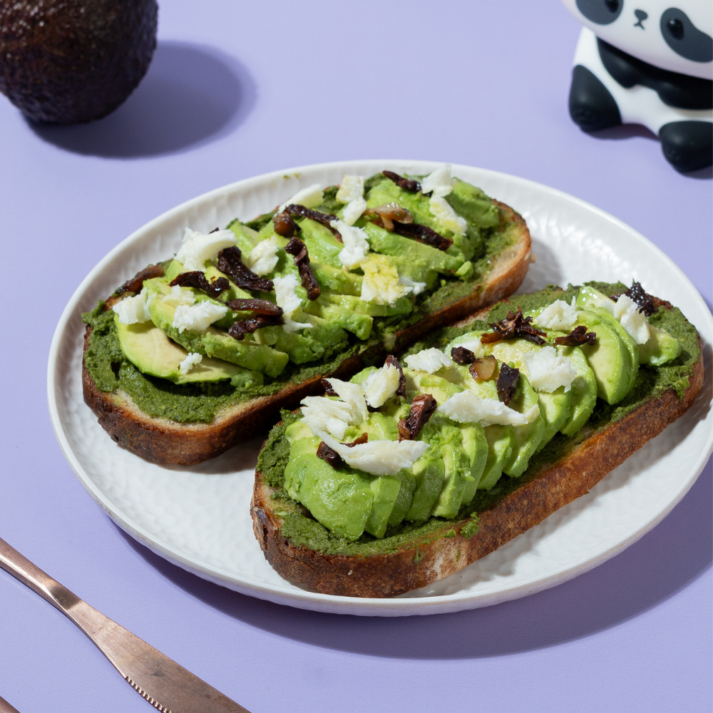 Freshly prepared healthy pesto avocado sourdough toast ready for delivery in Vadodara