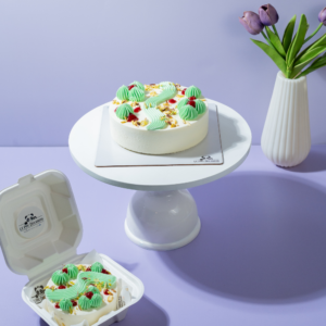Eggless pistachio and raspberry cake with pistachio ganache by Le Fou Delight Vadodara