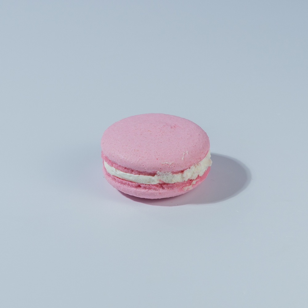 Raspberry Cheesecake Macaron (3) Raspberry Cheesecake Macaron filled with cheesecake cream and tangy raspberry compote Vadodara