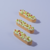Raspberry Pistachio Tart slice with visible raspberry compote, Le Fou Delight