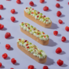 Raspberry Pistachio Tart slice with visible raspberry compote, Le Fou Delight