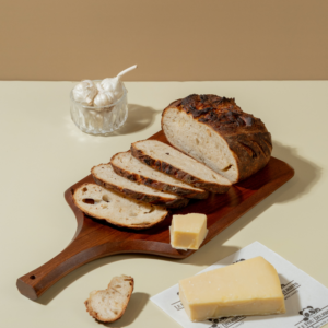 Freshly prepared savory garlic parmesan sourdough bread ready for bakery delivery in Vadodara