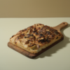 Freshly baked Italian roasted garlic potato focaccia bread drizzled with olive oil by Le Fou Delight Vadodara