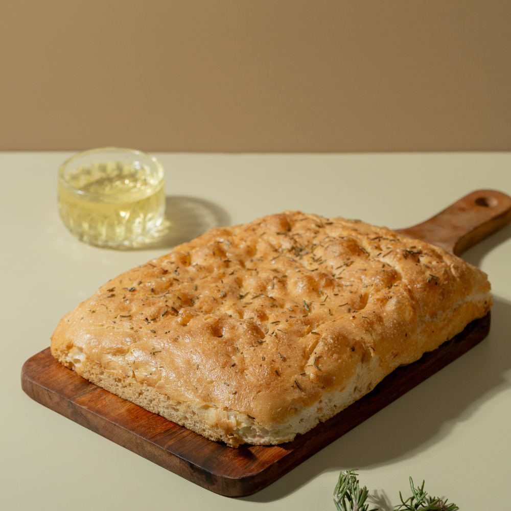 Fresh Rosemary Focaccia artisan bread with olive oil and rosemary by Le Fou Delight in Vadodara