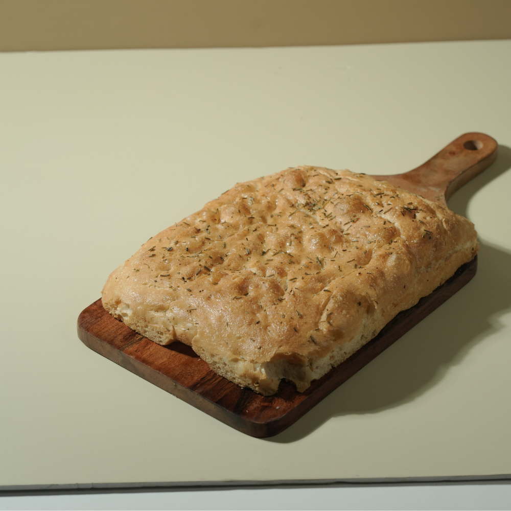 Fresh Rosemary Focaccia artisan bread with olive oil and rosemary by Le Fou Delight in Vadodara