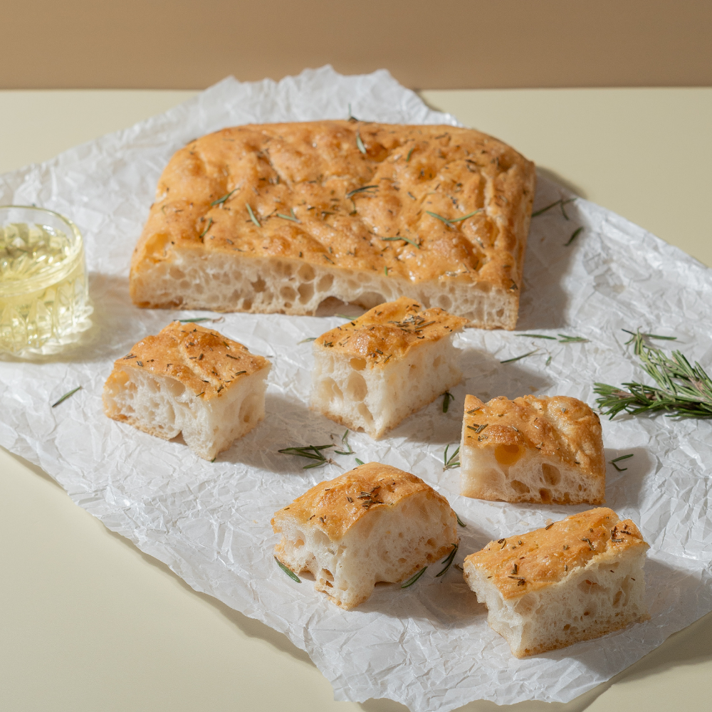 Fresh Rosemary Focaccia artisan bread with olive oil and rosemary by Le Fou Delight in Vadodara