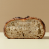 The Country Sourdough Sliced artisan country sourdough bread showing a soft airy crumb structure