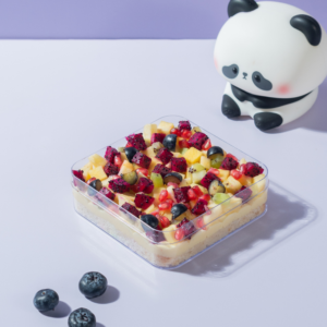 Layered eggless fruit trifle dessert tub with fresh seasonal fruits by Le Fou Delight Vadodara