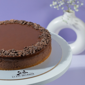 The ultimate chocolate cheesecake showing velvety texture and chocolate biscuit base